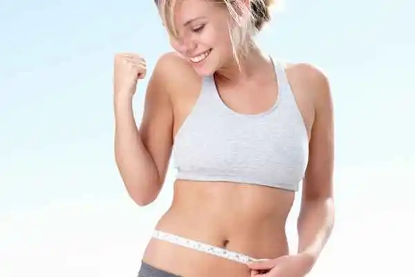 woman happy after fat reduction treatment Gloucestershire
