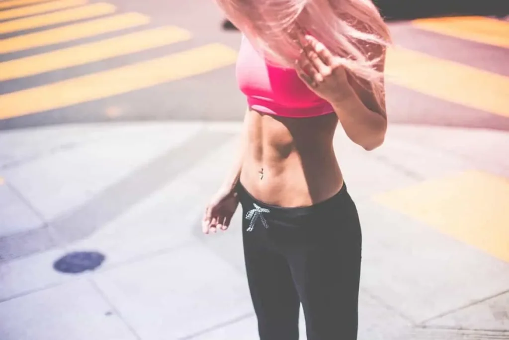 Woman with toned stomach after LA-EMS Body Sculpting Treatment Gloucestershire 